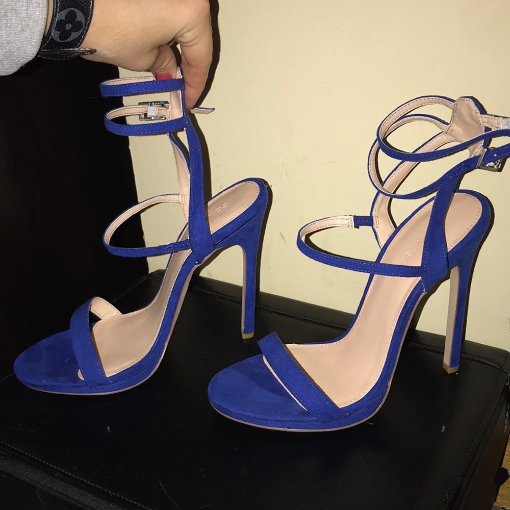 Never worn blue strappy heels